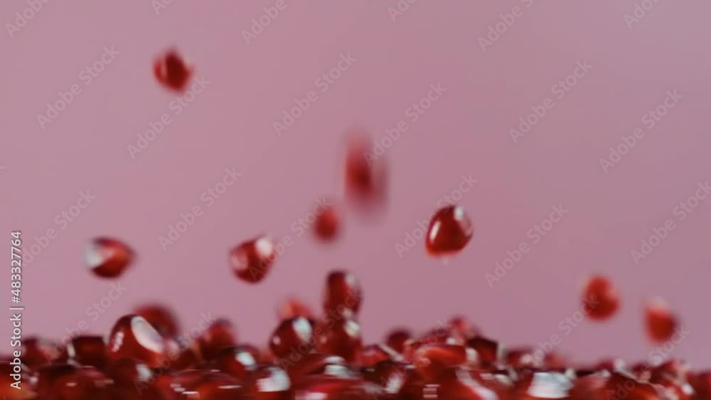 Pomegranate. Slowmotion video. Pomegranate seeds Pomegranate. Slowmotion video. Pomegranate seeds