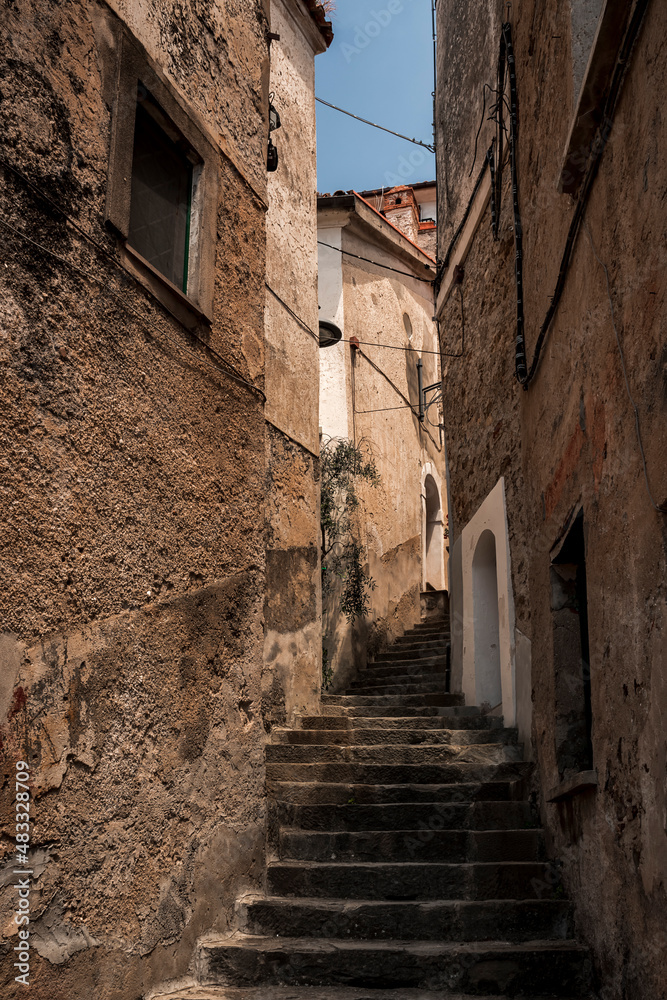 view through the alleys of a typical Italian historic center, a Unesco heritage site