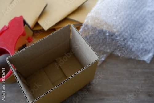 Brown adhesive tape and brown box and Air Bubble