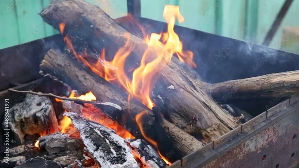 firewood is burning in the fire firewood is burning in the fire