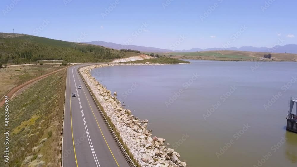 Aerial over dam wall with full dam Aerial over dam wall with full dam