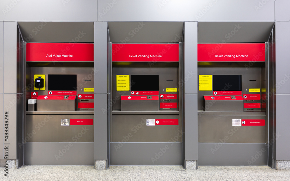 Set of ticket and add value vending machines with touch screens in the subway train station system for automatic passenger card sales Set of ticket and add value vending machines with touch screens in the subway train station system for automatic passenger card sales