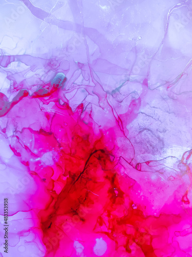 Background texture of alcohol ink in red color.  Abstract fire paint with drops and stains.