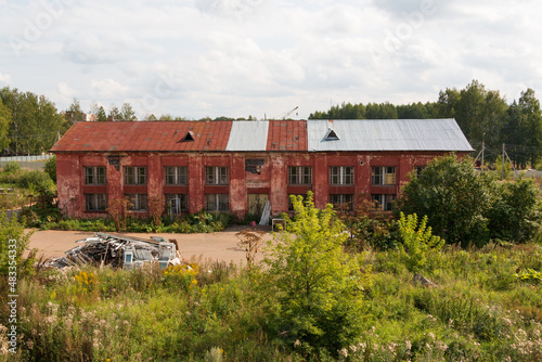 unfinished brick house for apartments. abandoned red brick building. deceived equity holders who invested in construction