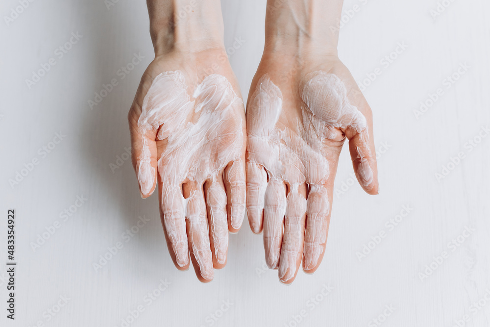 Fototapeta premium Soap hands in foam beauty health on a white background isolated