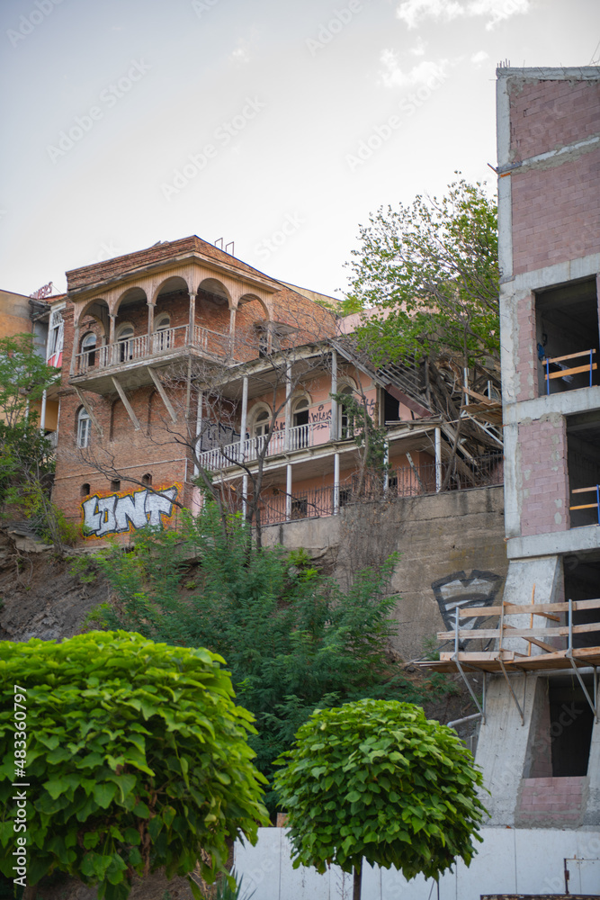 beautiful house with balconies on a cliff in Tbilisi