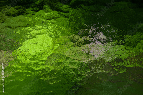 Blurred green spotted glass background photography