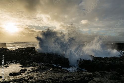 Ocean scenery with strong waves while sunset at the raw coast of Rekjanes peninsula, Iceland