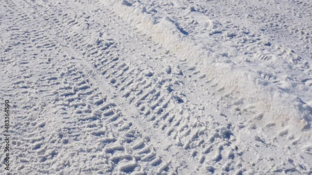 car tire marks on the snow, tire marks on the snow,