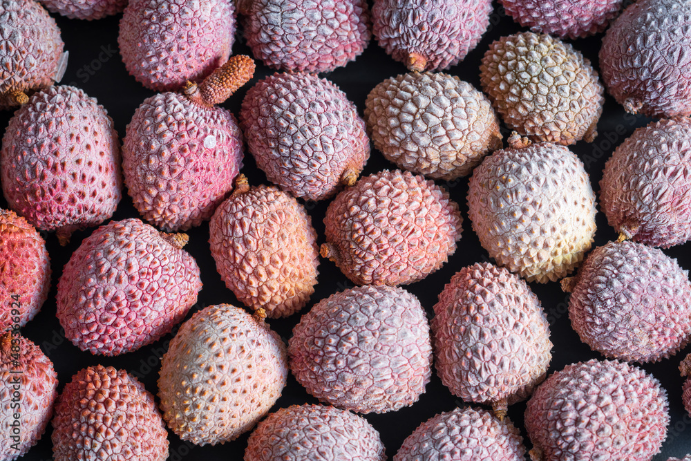 frost frozen lychee fruits background
