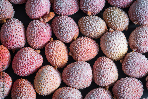 frost frozen lychee fruits background