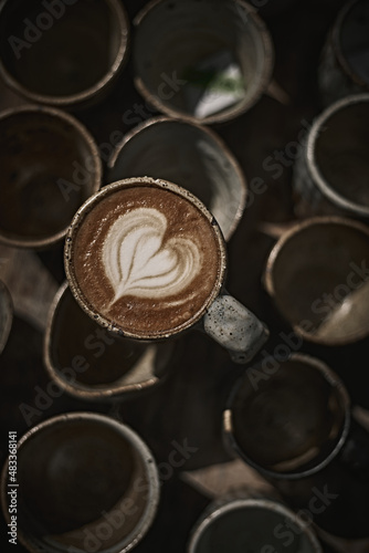 Selective focus cup of hot latte art coffee