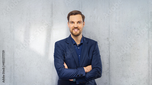  Portrait of a happy young casual man standing