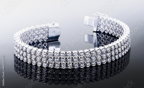 Diamond jewelry. Diamond bracelet on black background