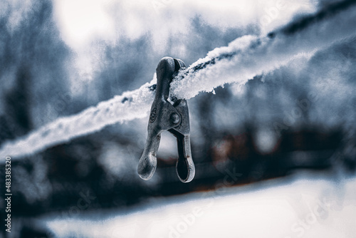 clothespin on the snow