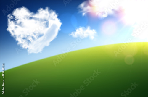 Heart shape white clouds on blue sky background. Green hill. Valentine's day.