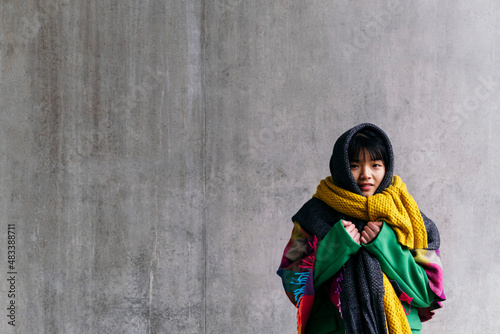 Woman wearing layers of warm clothing