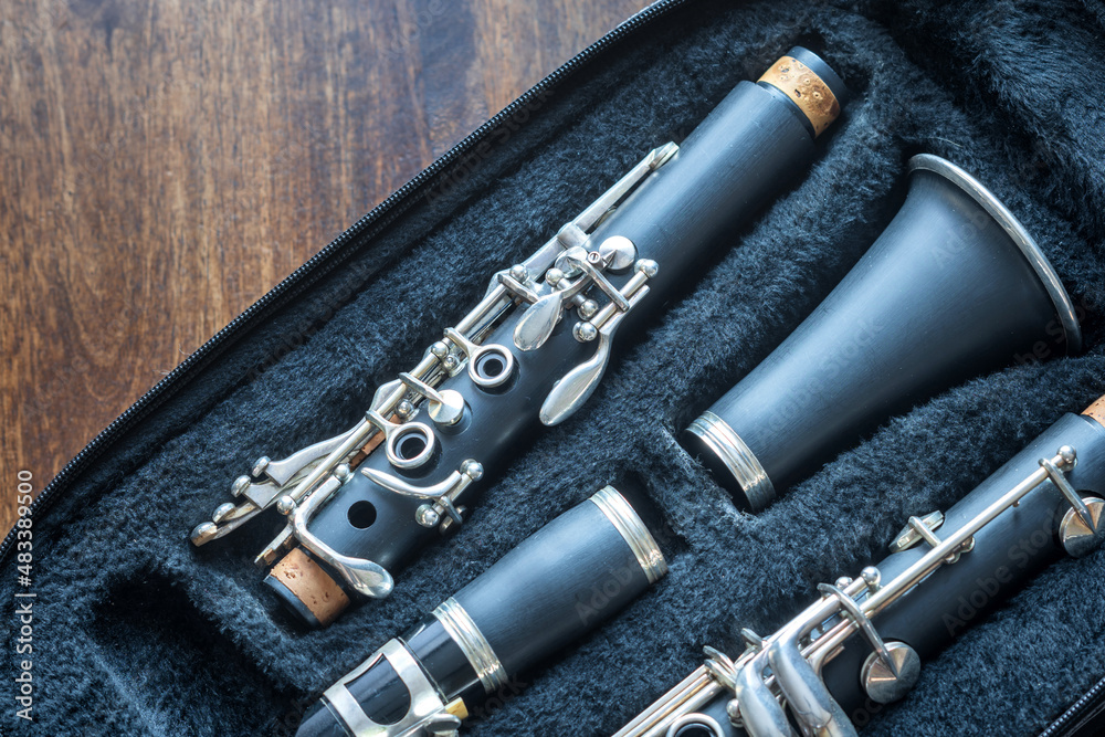 Naklejka premium clarinet inside musical instrument storage case closeup