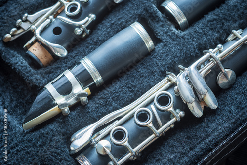 Fotografija clarinet inside musical instrument storage case closeup
