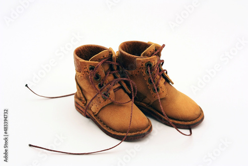 Old brown leather trekking shoes