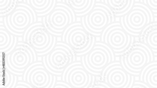 Animated video of abstract background of grey circles overlapping each other on white background. Video pans seamless pattern. Modern, neutral background. Copy space.