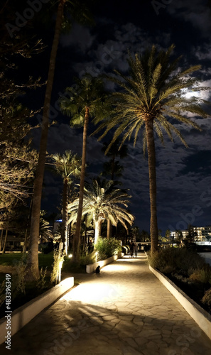 Evening promenade along the sea on Nissi beach in Ayia Napa in Cyprus