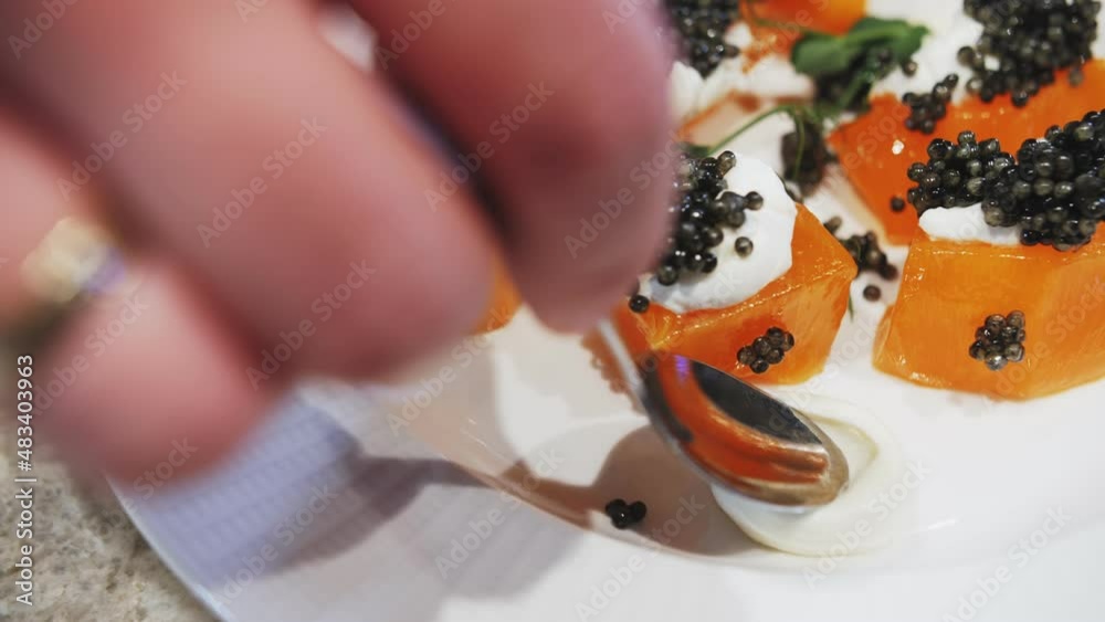 preparation of snacks with black caviar preparation of snacks with black caviar