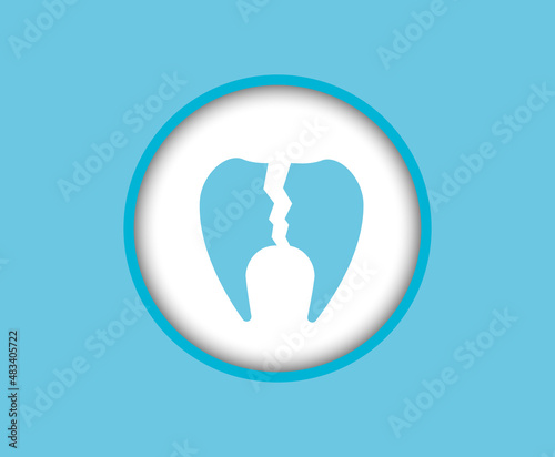 A crack, a broken tooth, an icon on a blue background.