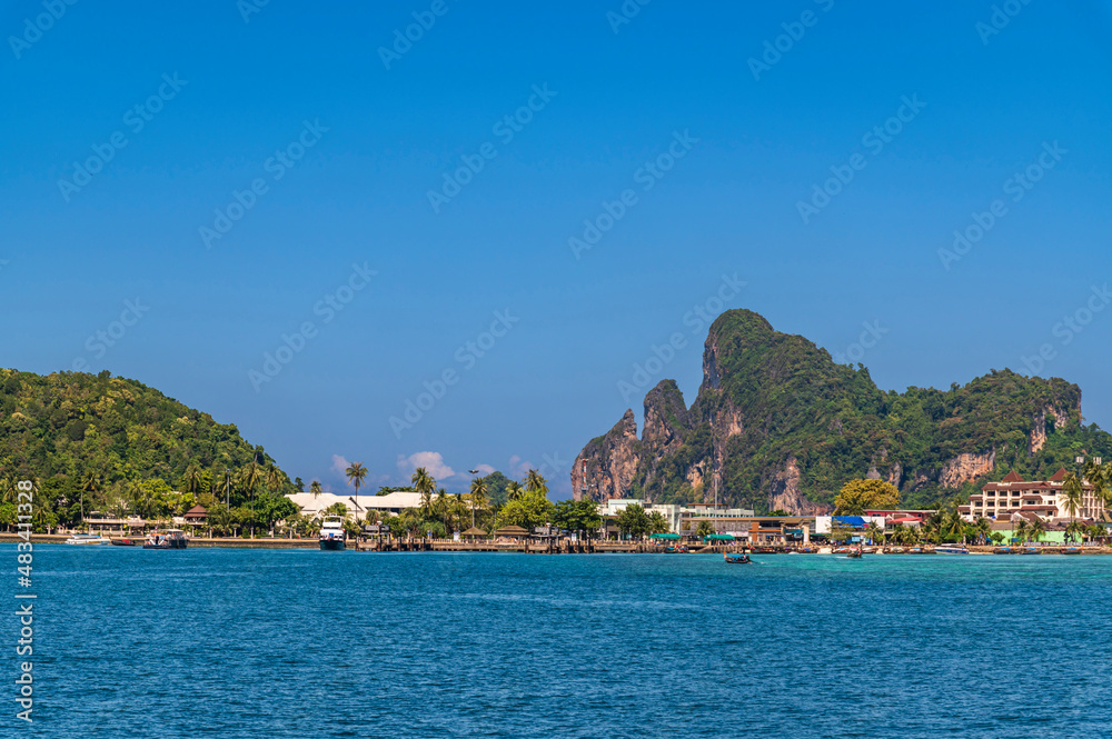 Beautiful Andaman sea, Tropical Turquoise clear blue sea background at tonsai beach dock, phi phi island and is famous tourist attraction in thailand