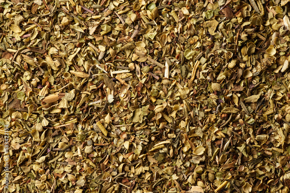 Dried herbs mixture for cooking background. Top view macro photo with shallow depth of field. Dried herbs mixture for cooking background. Top view macro photo with shallow depth of field.