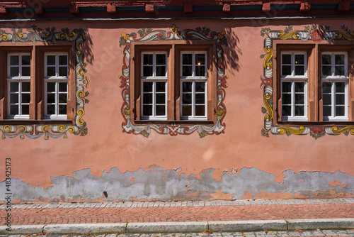 Façade of the town hall in Grünberg/Germany with its magnificently decorated windows  photo