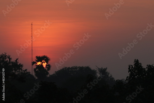 Orange light of Sunrise and silhouette in the morning