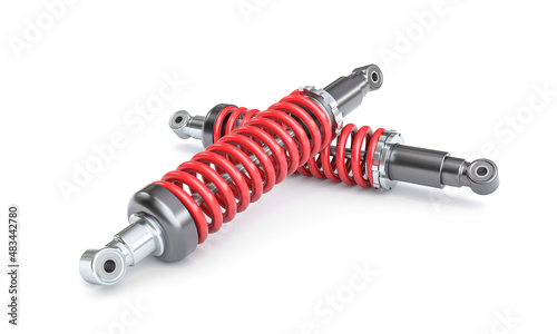 car shock absorbers with red spring photo