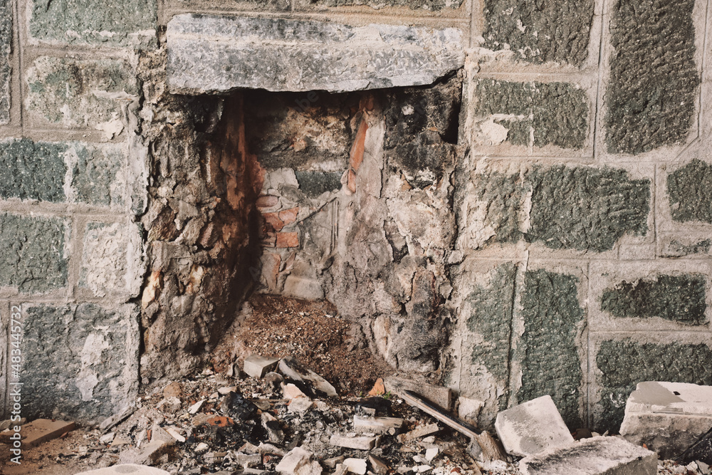 stone fireplace of an old ruined stone house, vintage stone fireplace of an old ruined stone house, vintage