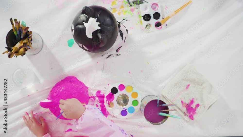 Flat lay. Painting craft pumpkin with acrylic paint for Halloween. Flat lay. Painting craft pumpkin with acrylic paint for Halloween.