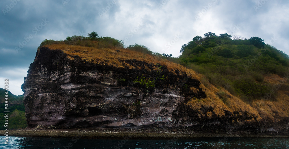 Scenic view of Rock Island over crystal clear sea water Scenic view of Rock Island over crystal clear sea water