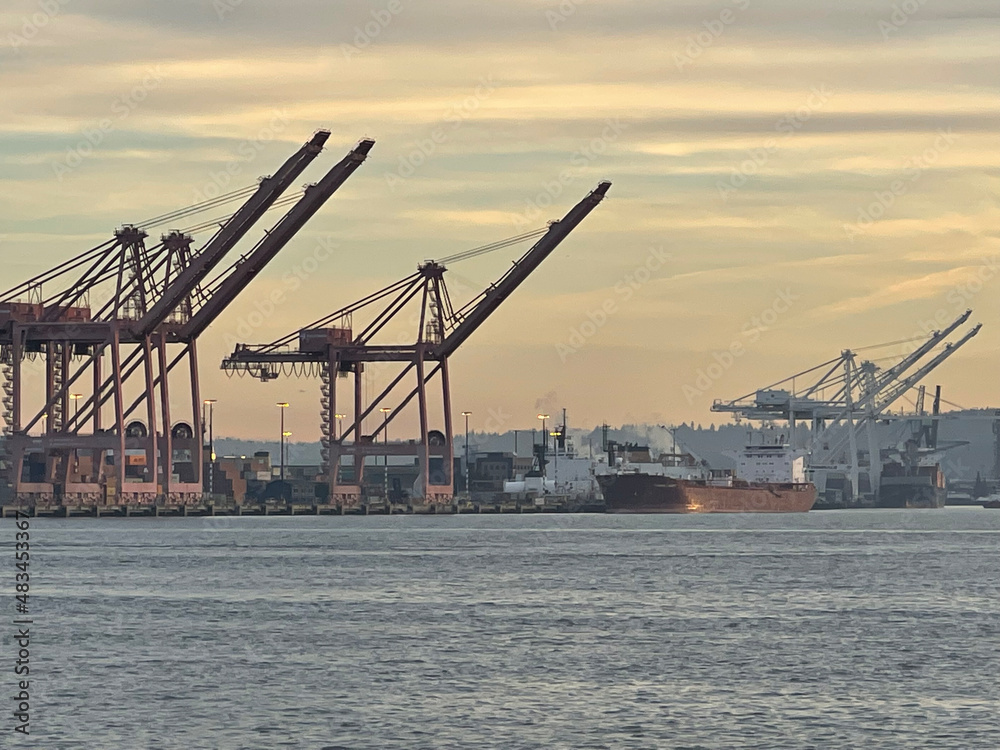 The commercial docks in Seattle Washington during sunset.