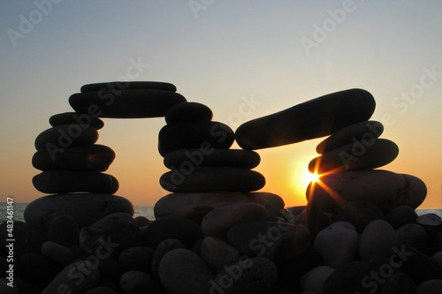 Sea pebble towers on seacoast