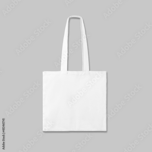 White textile eco bag on light grey background. Mock up for design