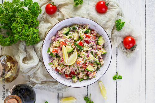 Vegetarian tabbouleh salad. Traditional Middle Eastern or Arabic cuisine photo