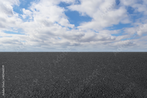 View of empty asphalt road on sunny day © New Africa