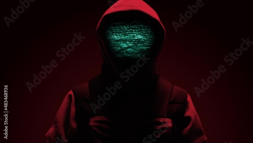 Computer hacker with hoodie. Computer abstract digital code at the background. Darknet fraud and cryptocurrency bitcoin concept. Cybersecurity and data protection in social network