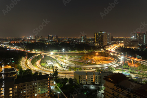 Aerial view of highway street road at Bangkok Downtown Skyline, Thailand. Financial district and business centers in smart urban city in Asia.Skyscraper and high-rise buildings at night