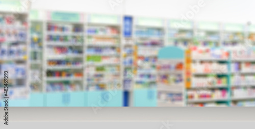 Pharmacy table banner background. Blur counters of pharmacy with medicines, tablets and pills.