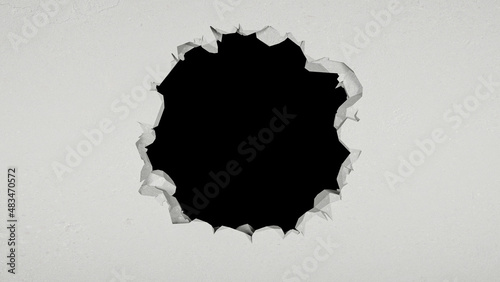 breach in the white wall in the form of a circle