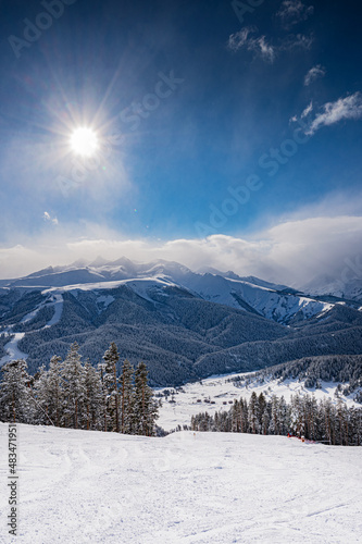 Fototapeta Naklejka Na Ścianę i Meble -  Beautiful landscape winter summer day on mountain in ski resort Arkhyz, Caucasus mountains, Russia. Vertical orientation
