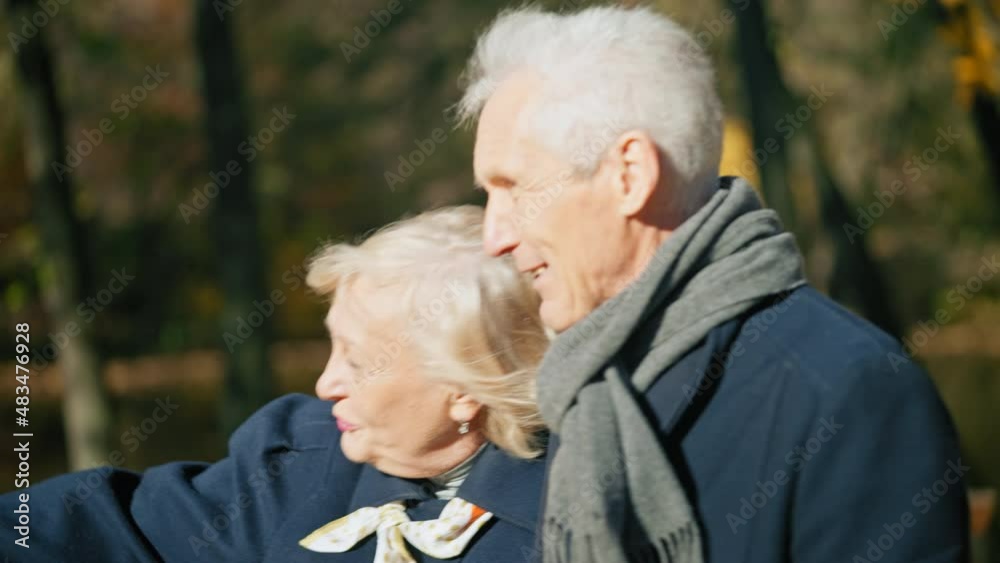 Beautiful mature woman sharing her thoughts and ideas with beloved man, date Beautiful mature woman sharing her thoughts and ideas with beloved man, date