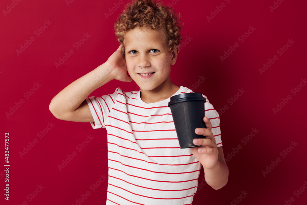 kinky boy in striped t-shirt disposable drink glass childhood kinky boy in striped t-shirt disposable drink glass childhood
