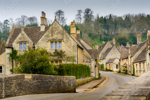 Typical quaint cottages of the village of Castle Combe in the Cotswolds photo