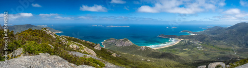 Wide panoramic landscape of scenic coastline and green hills in Wilsons Promontory, Victoria, Australia photo